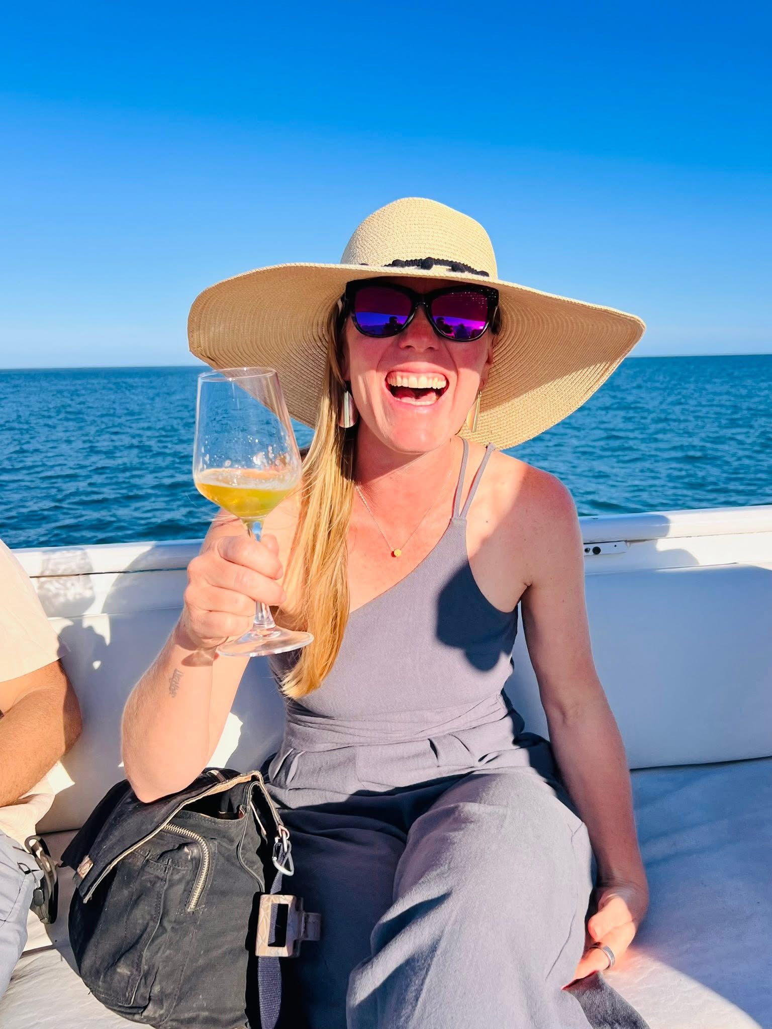 Guest enjoying wine aboard Sea Señor