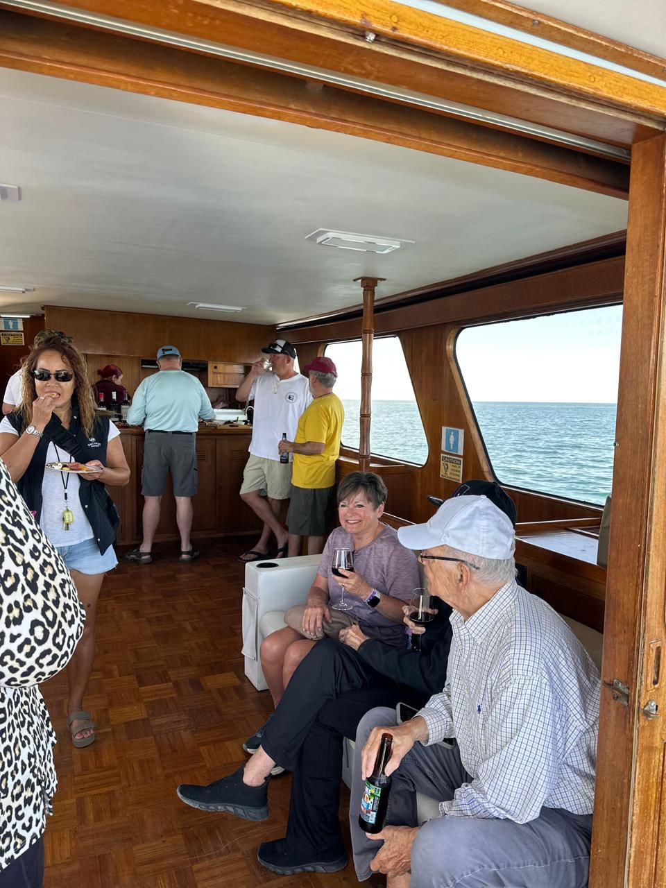 Spacious wood-finished interior aboard Sea Señor